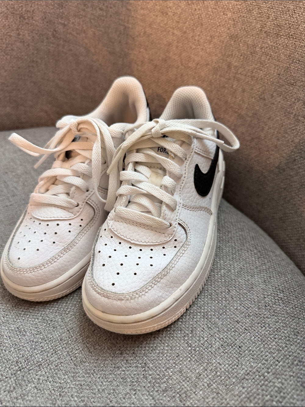 Nike Kids White Sneakers with Black Swoosh